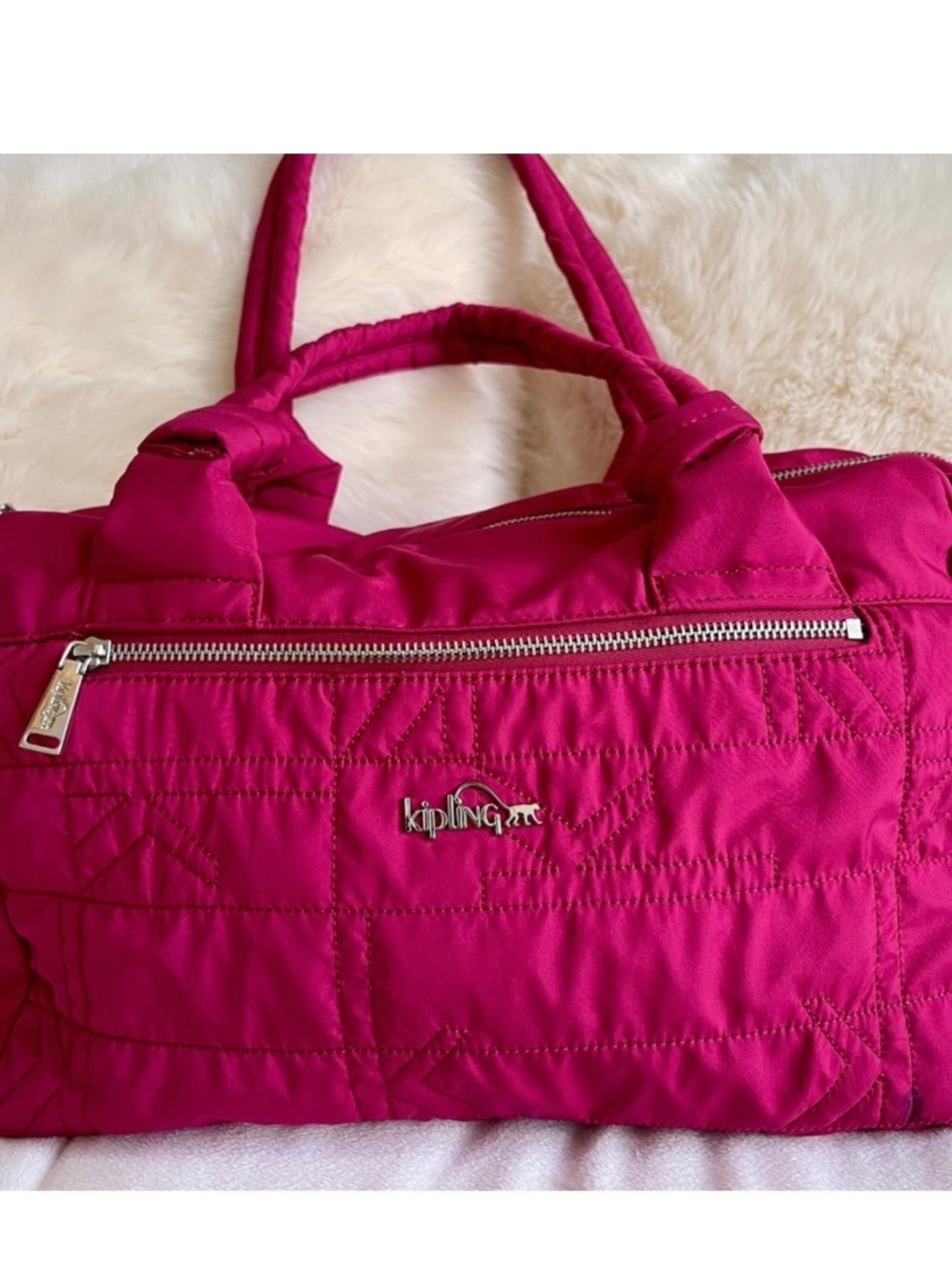Kipling fushia